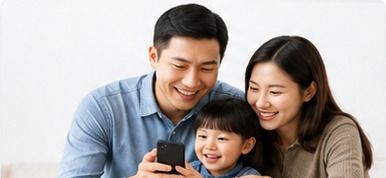 A family reviewing transfer details on a mobile phone